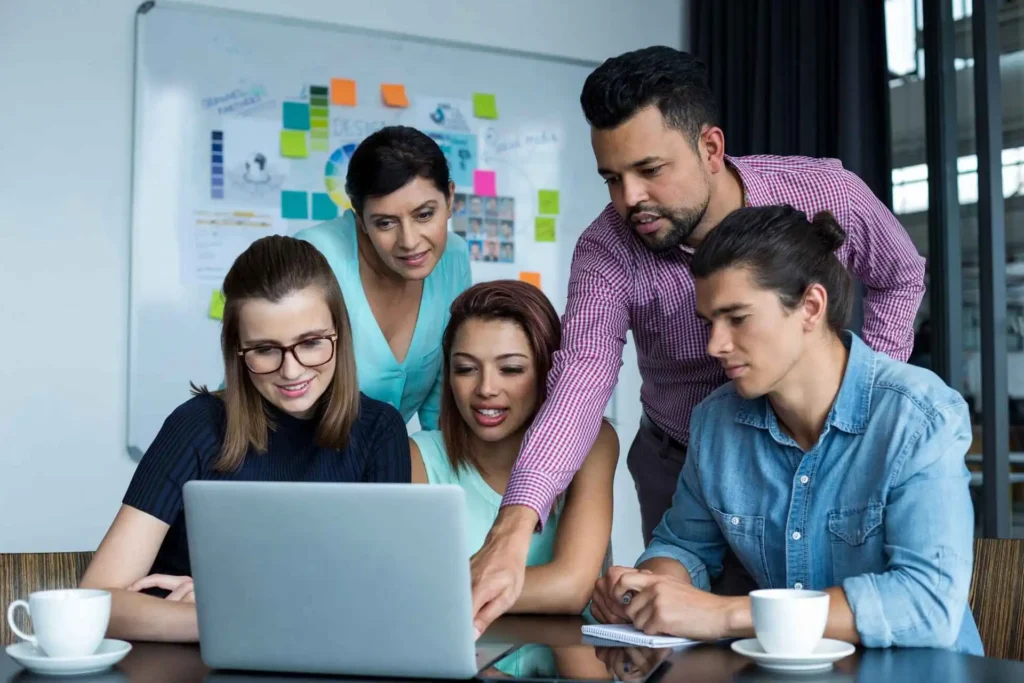 businesspeople having discussion over laptop in of 2023 11 27 05 00 37 utc 1 1